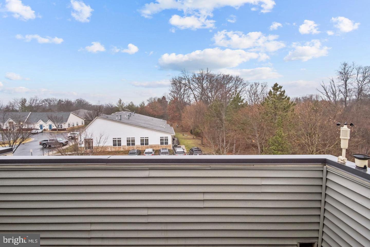 43821 Stubble Cor Square Ashburn, VA 20147 - Photo 21 of 25 a view of a city from a balcony