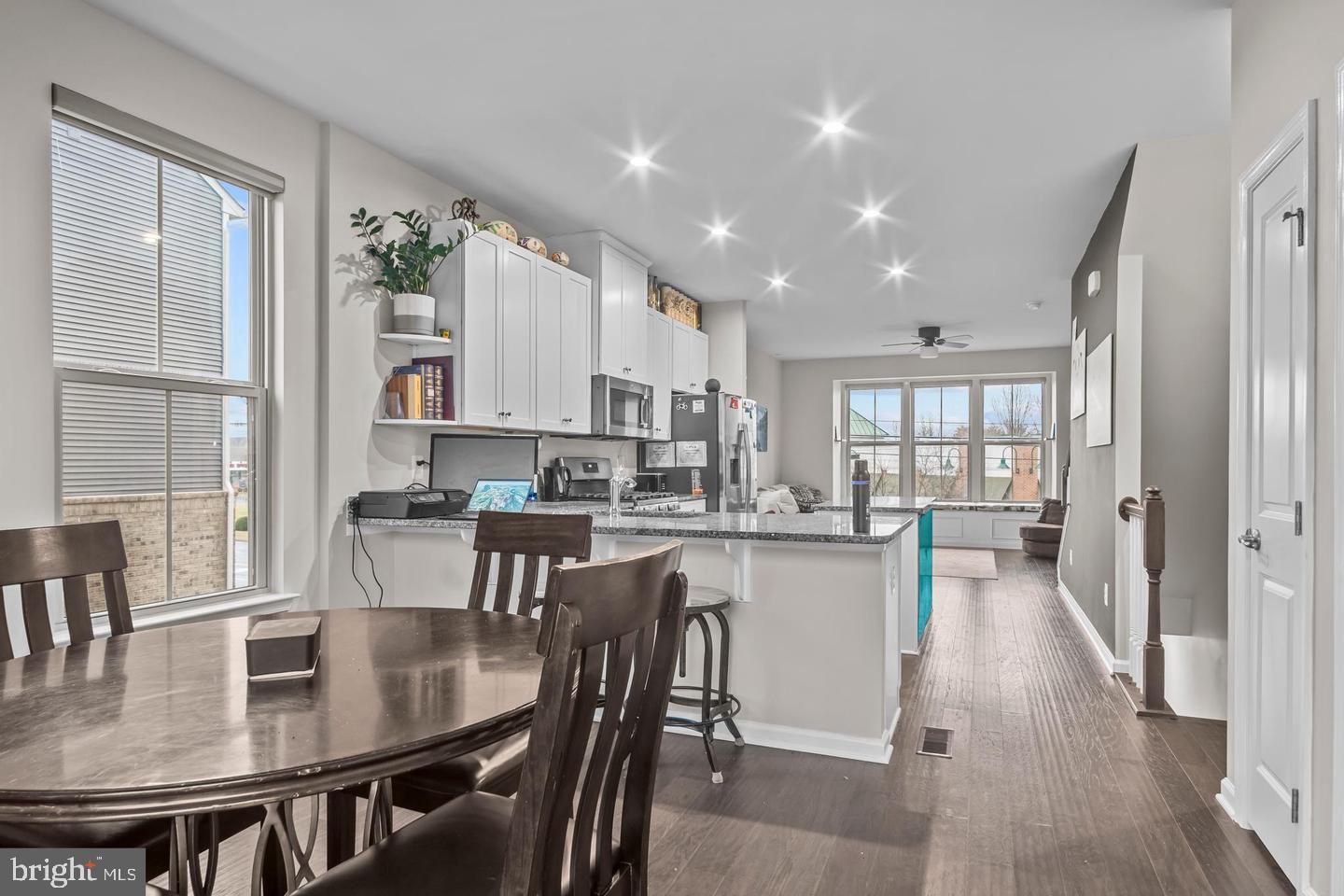43821 Stubble Cor Square Ashburn, VA 20147 - Photo 6 of 25 a large kitchen with a table and chairs