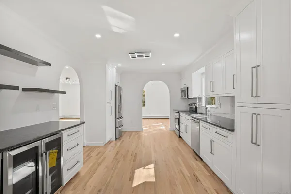 a bathroom with a sink and a bathtub