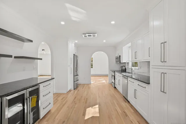 a bathroom with a sink and a shower