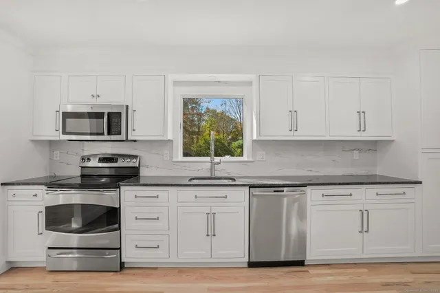a bathroom with a sink and a bathtub