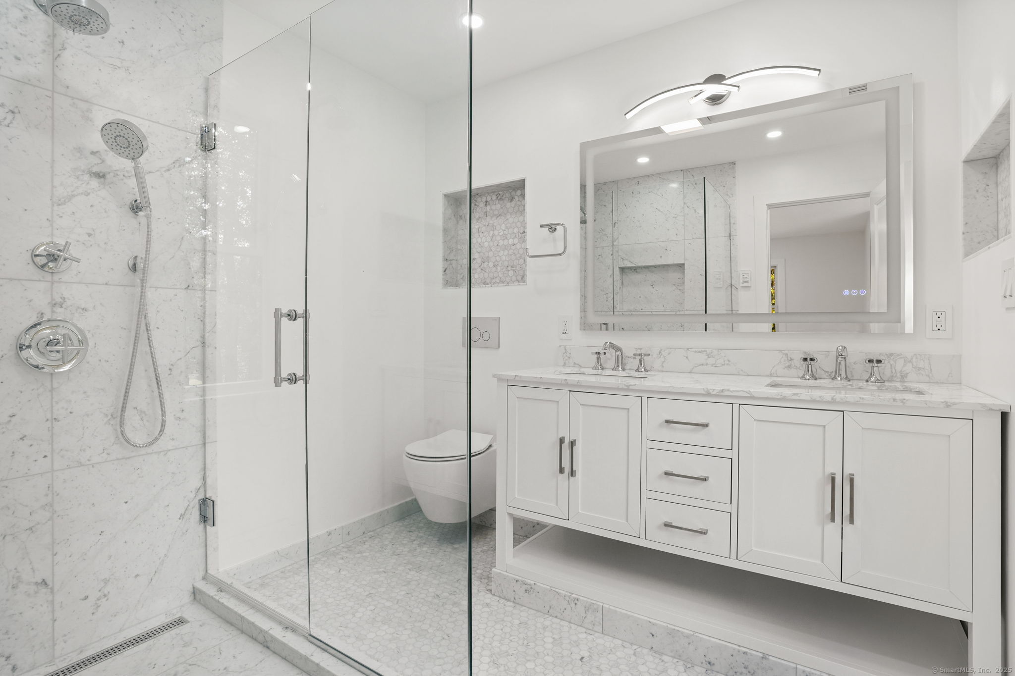 4 Trails End Road Weston, CT 06883 - Photo 23 of 40 a bathroom with a granite countertop sink two mirror and a shower