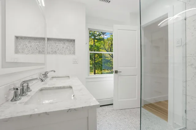 a view of entryway with wooden floor