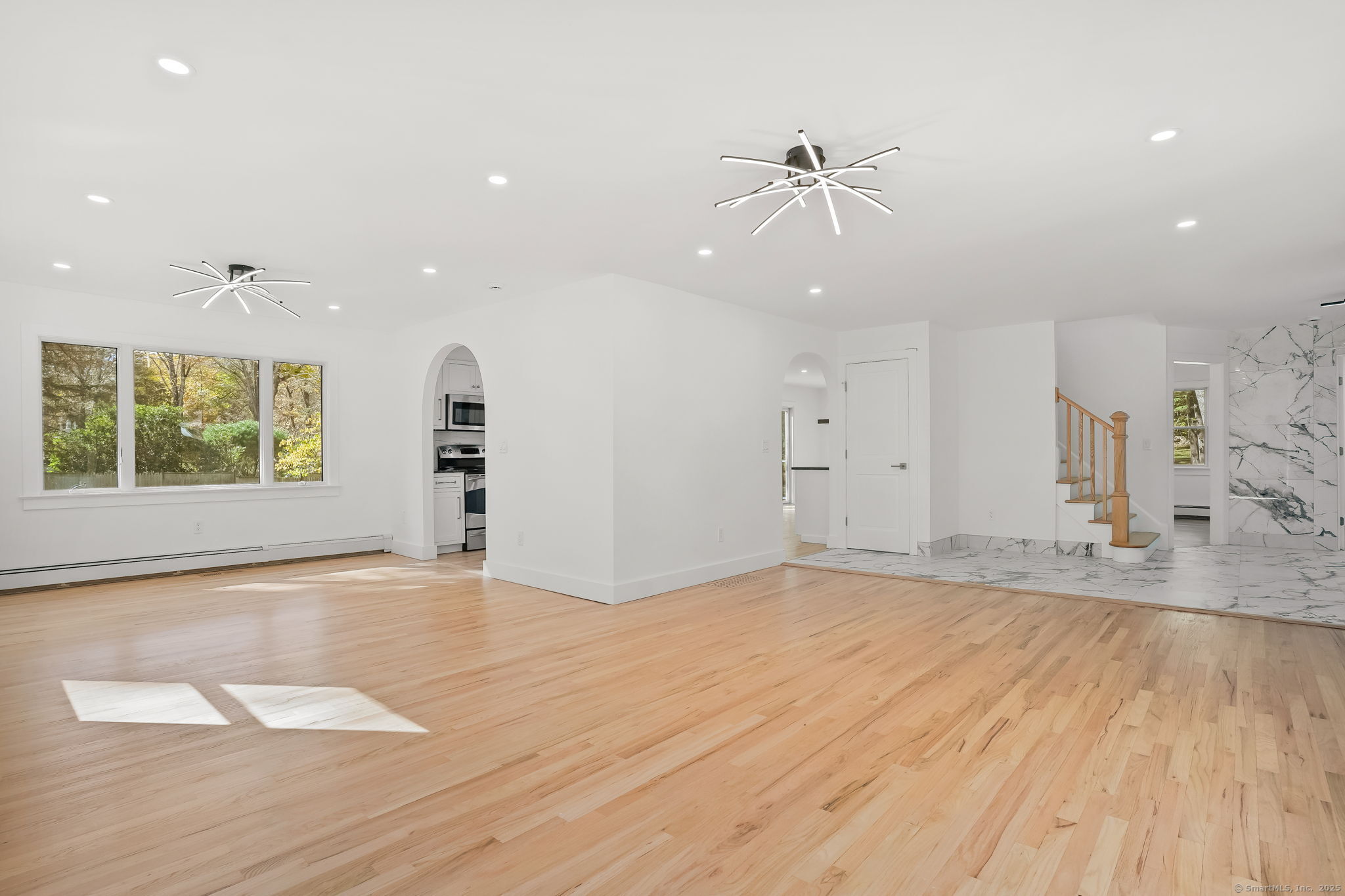 4 Trails End Road Weston, CT 06883 - Photo 24 of 40 wooden floor in an empty room with a window