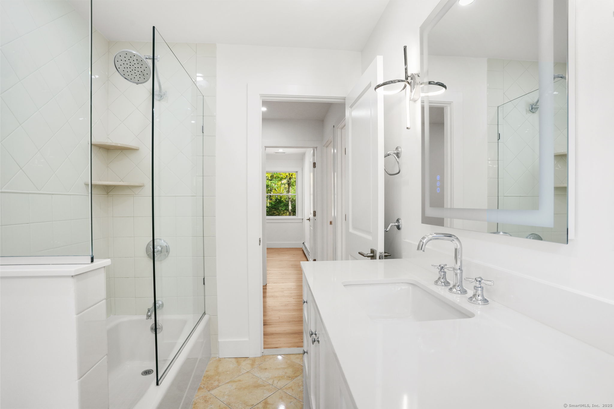 4 Trails End Road Weston, CT 06883 - Photo 29 of 40 a bathroom with a tub sink and mirror