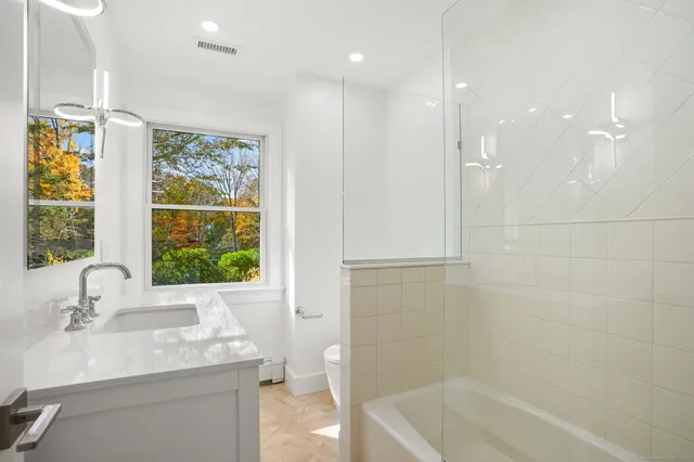 a aerial view of a house with a yard