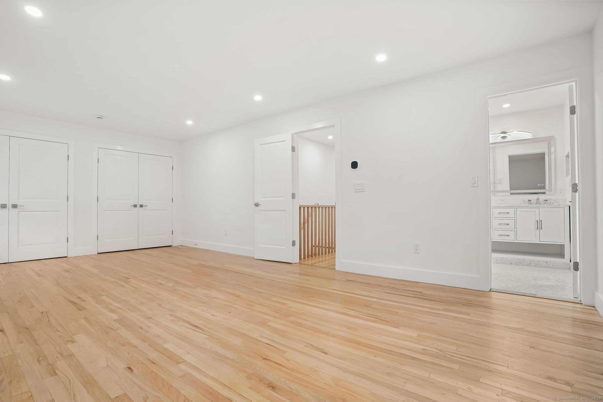 4 Trails End Road Weston, CT 06883 - Photo 39 of 40 a view of empty room with wooden floor