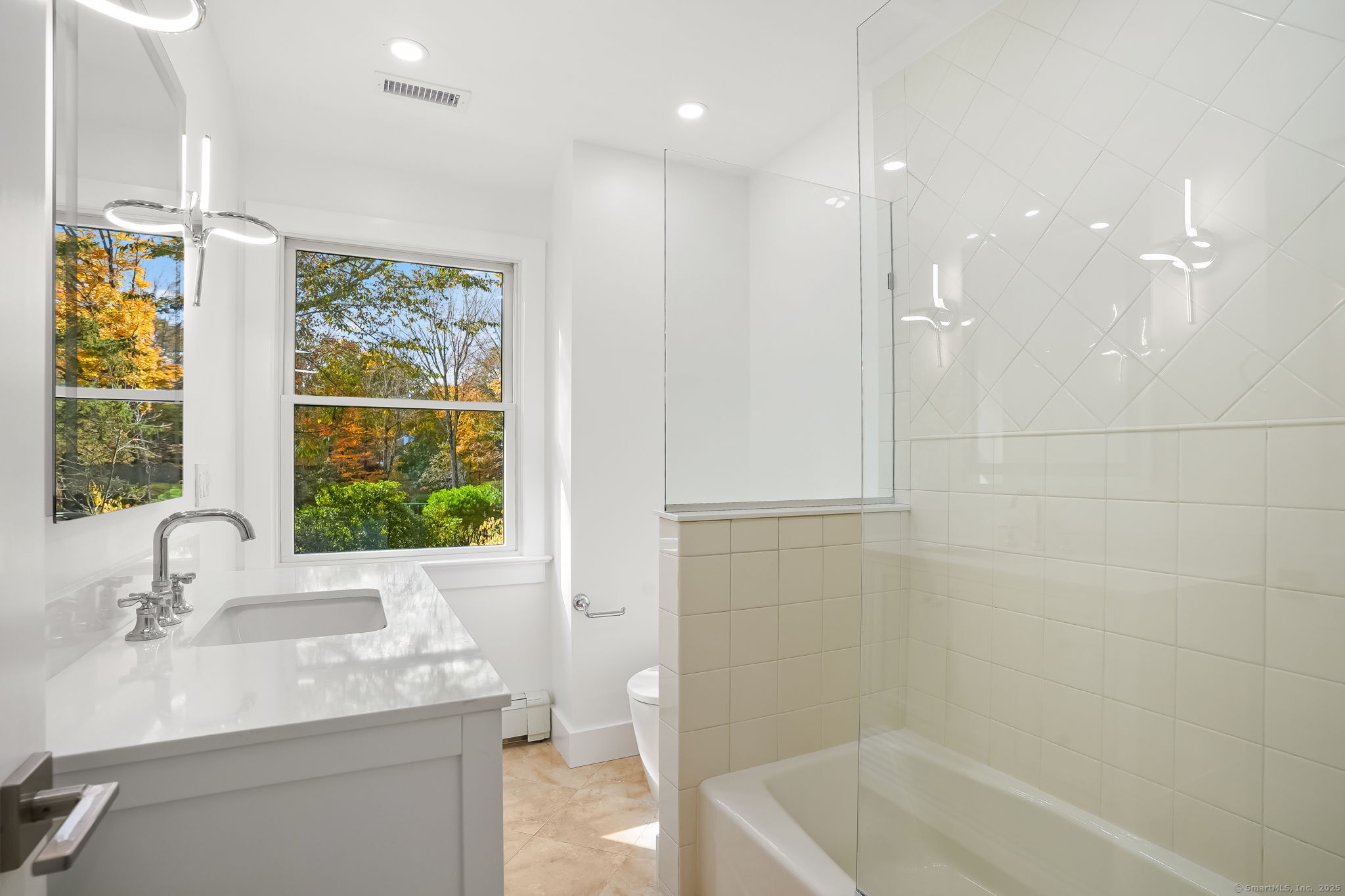4 Trails End Road Weston, CT 06883 - Photo 7 of 40 a bathroom with a granite countertop sink a toilet and shower