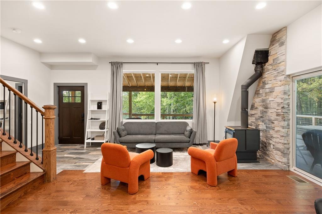 146 Luna Way Markleton, PA 15551 - Photo 13 of 50 a living room with furniture and a fireplace