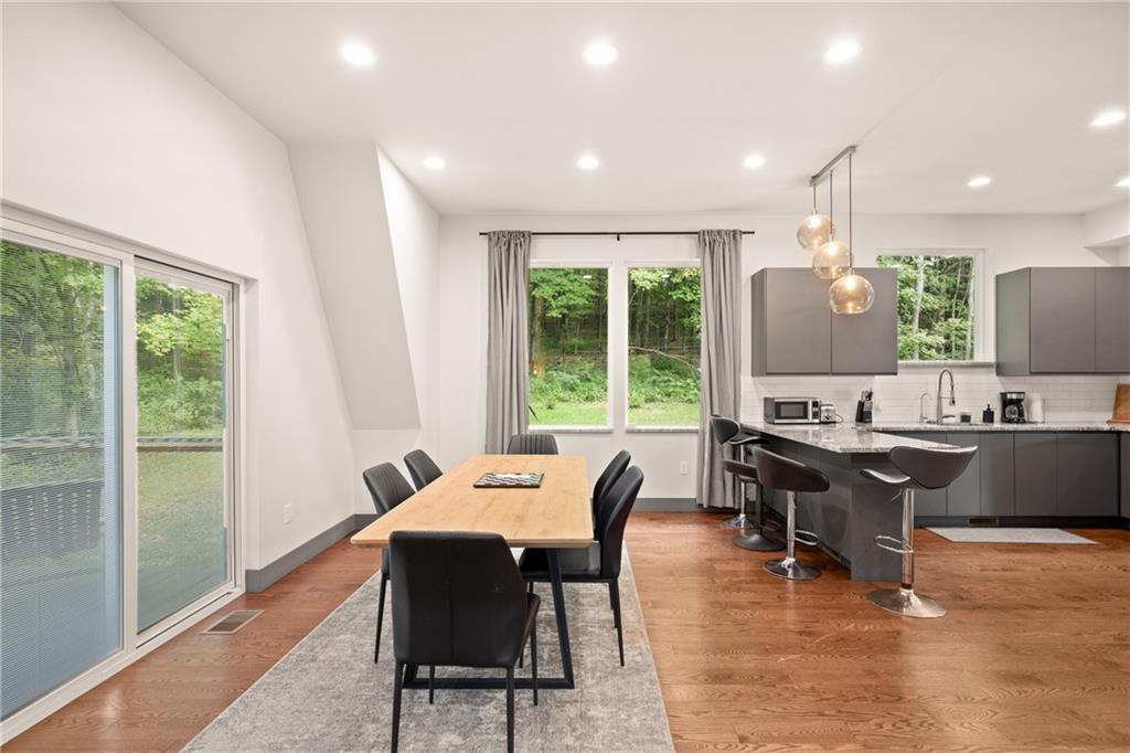 146 Luna Way Markleton, PA 15551 - Photo 14 of 50 a view of a dining room with furniture window and wooden floor