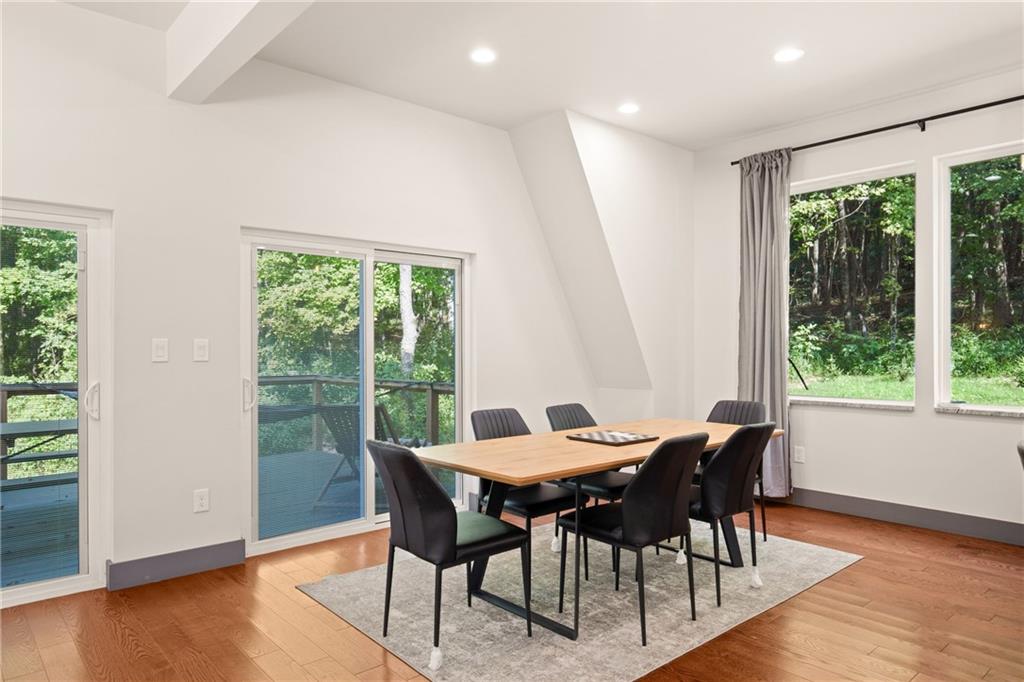 146 Luna Way Markleton, PA 15551 - Photo 15 of 50 a view of a dining room with furniture and wooden floor