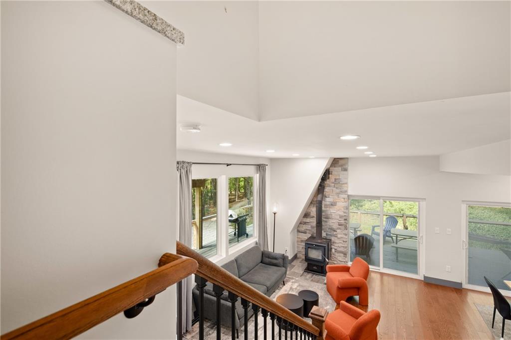 146 Luna Way Markleton, PA 15551 - Photo 24 of 50 a view of a livingroom with furniture wooden floor and windows