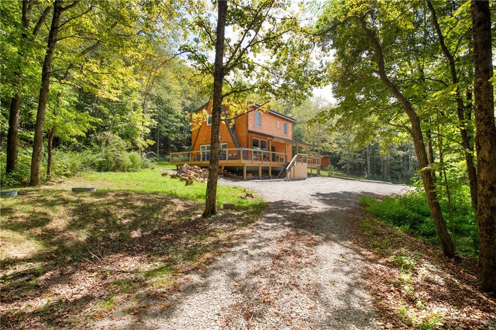 146 Luna Way Markleton, PA 15551 - Photo 3 of 50 a house is sitting in middle of the forest