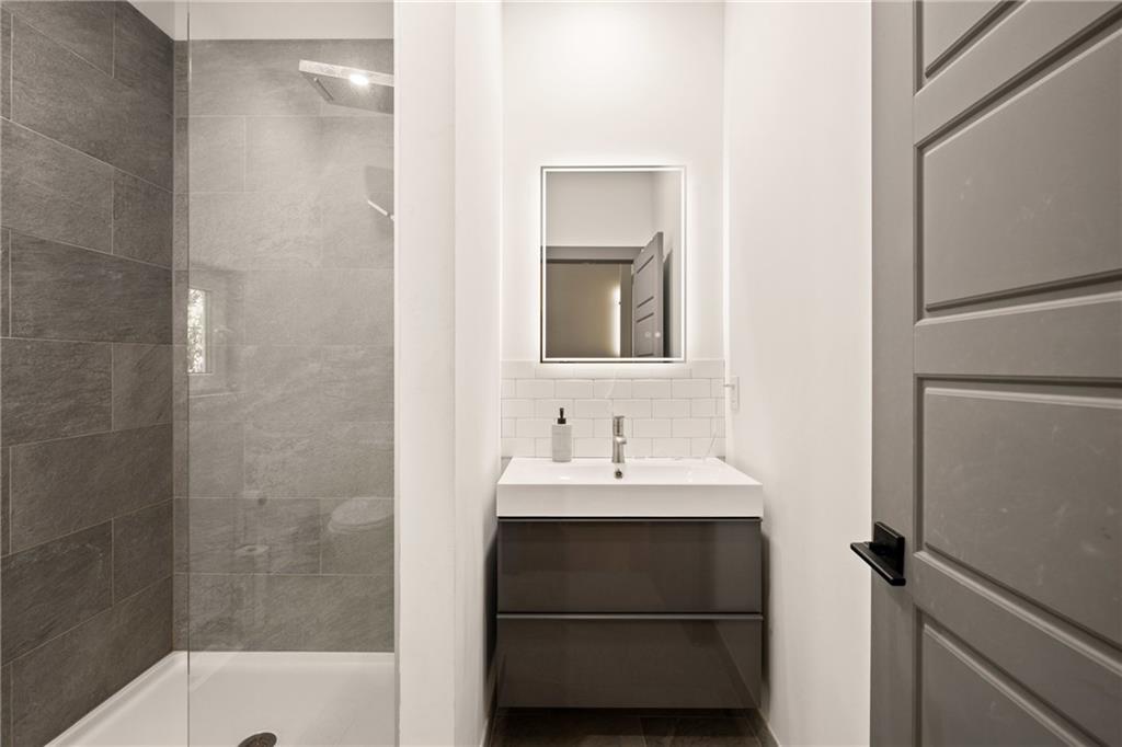 146 Luna Way Markleton, PA 15551 - Photo 32 of 50 a bathroom with a sink a toilet a shower and a mirror