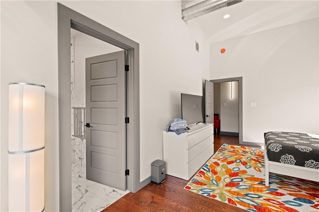 146 Luna Way Markleton, PA 15551 - Photo 35 of 50 a bedroom with a bed and a dresser in it