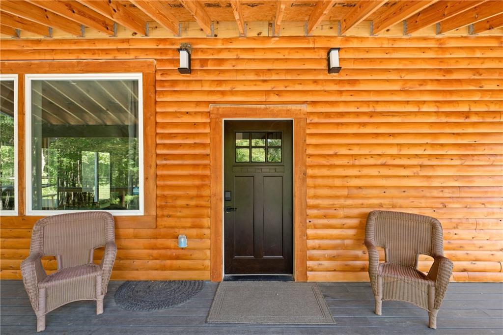 146 Luna Way Markleton, PA 15551 - Photo 7 of 50 a brick building with a bench and a window