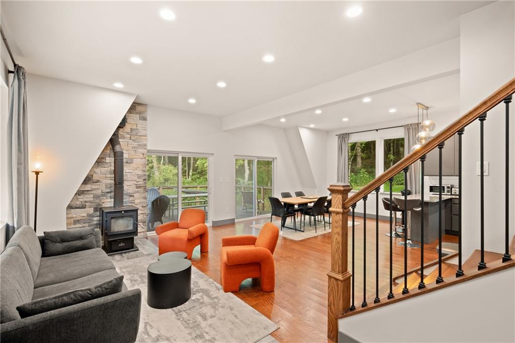 146 Luna Way Markleton, PA 15551 - Photo 9 of 50 a living room with furniture and large windows