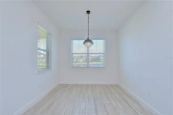 a view of a kitchen from the hallway