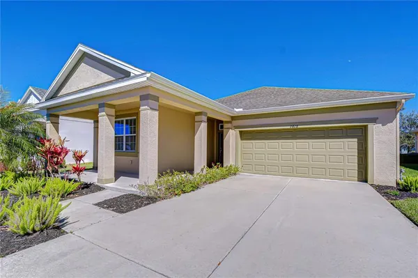 a view of a house with a garage