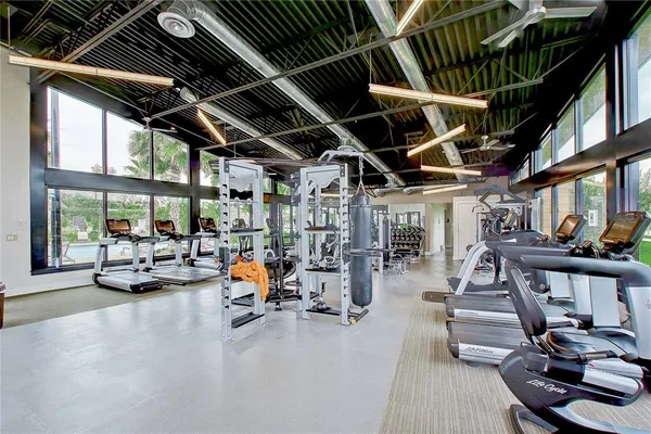 a view of a swimming pool with an outdoor space and seating area