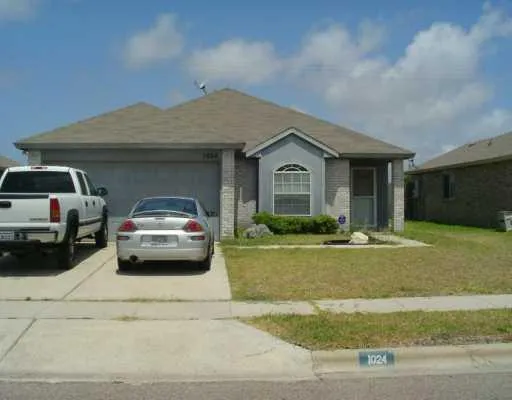 a car parked in front of a house