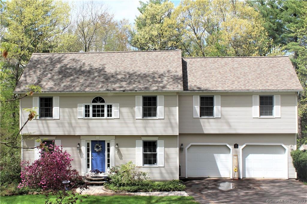 815 Newgate Road Suffield, CT 06093 - Photo 1 of 1 a front view of a house with garden