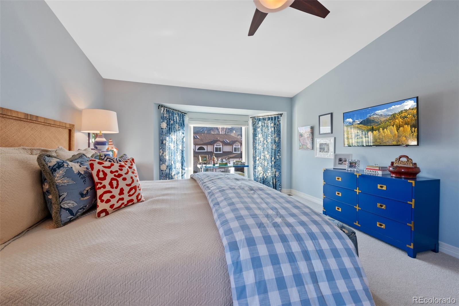 145 Willowleaf Drive Littleton, CO 80127 - Photo 22 of 42 a bed room with a bed and a dresser