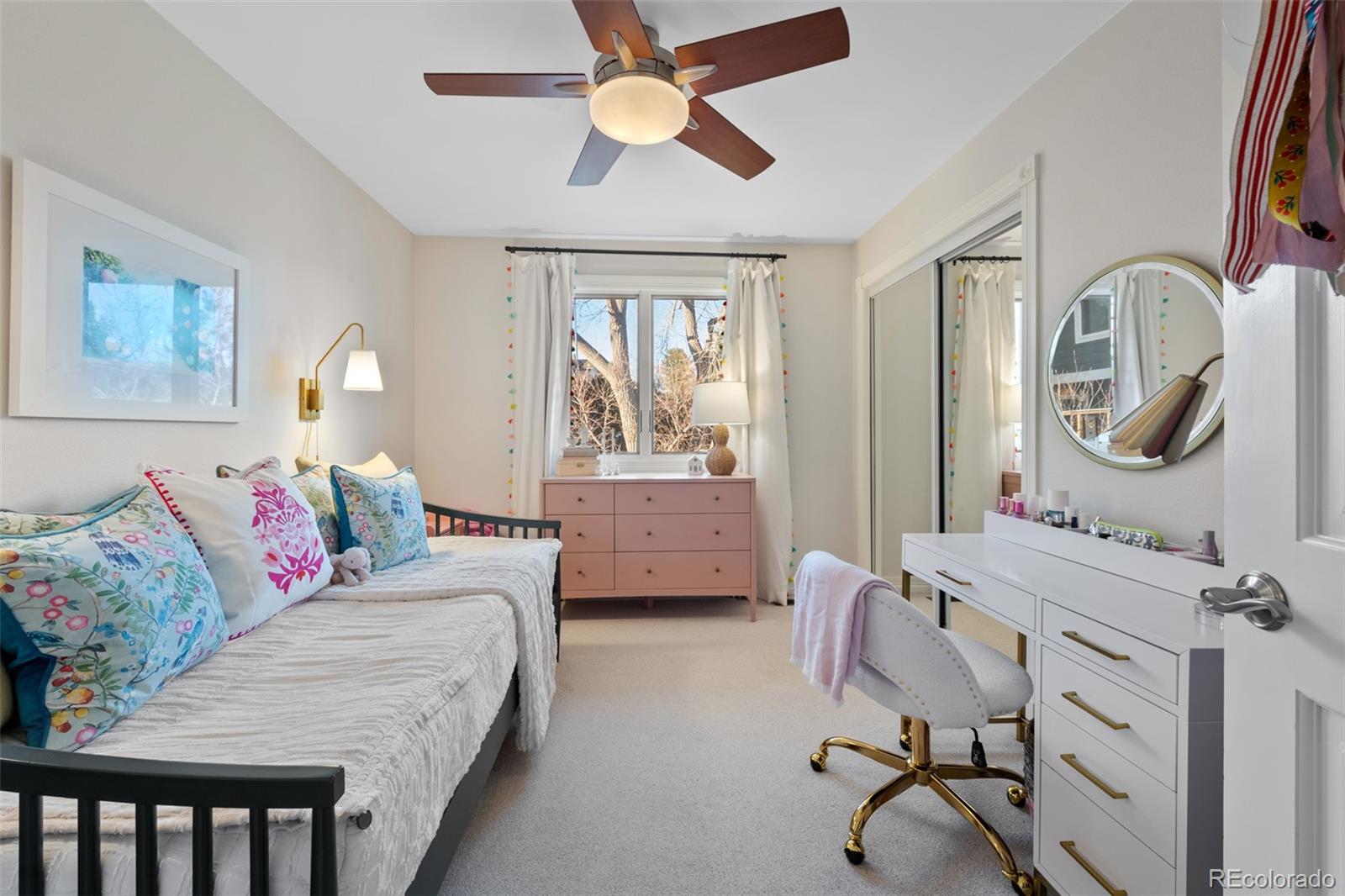145 Willowleaf Drive Littleton, CO 80127 - Photo 29 of 42 a living room with furniture and a large window