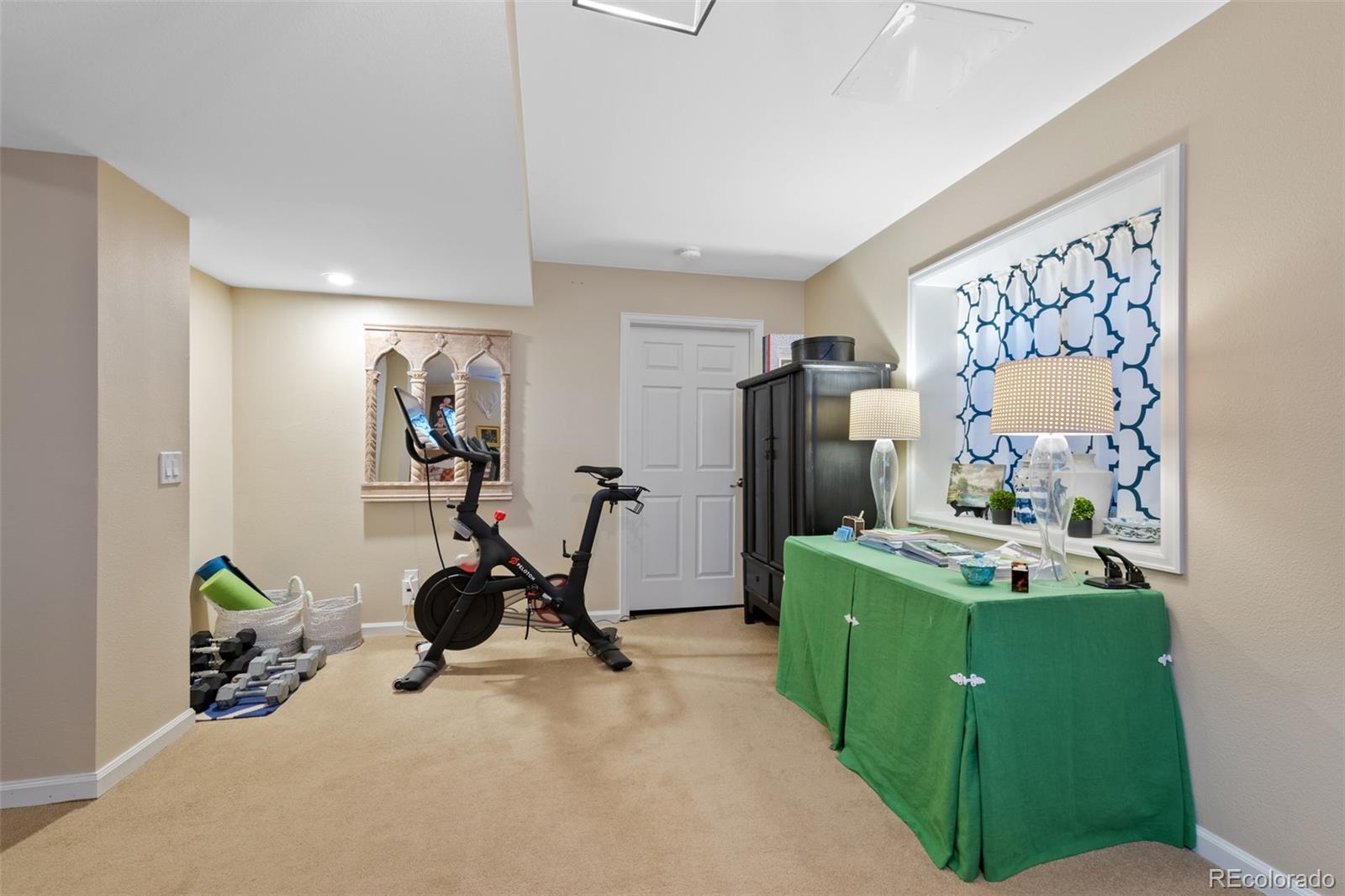 145 Willowleaf Drive Littleton, CO 80127 - Photo 34 of 42 a view of a room with gym equipment