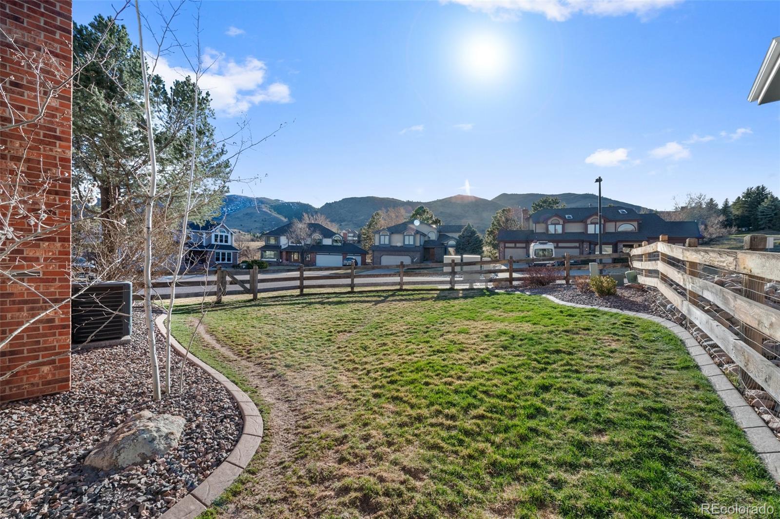145 Willowleaf Drive Littleton, CO 80127 - Photo 36 of 42 a view of a swimming pool with outdoor seating