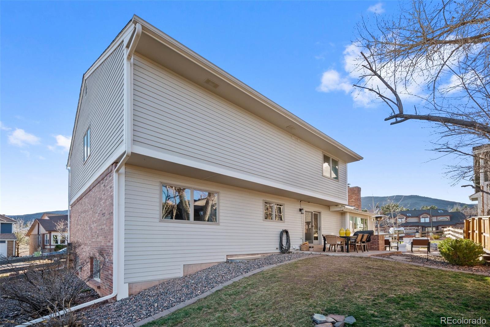 145 Willowleaf Drive Littleton, CO 80127 - Photo 41 of 42 a view of a house with a yard