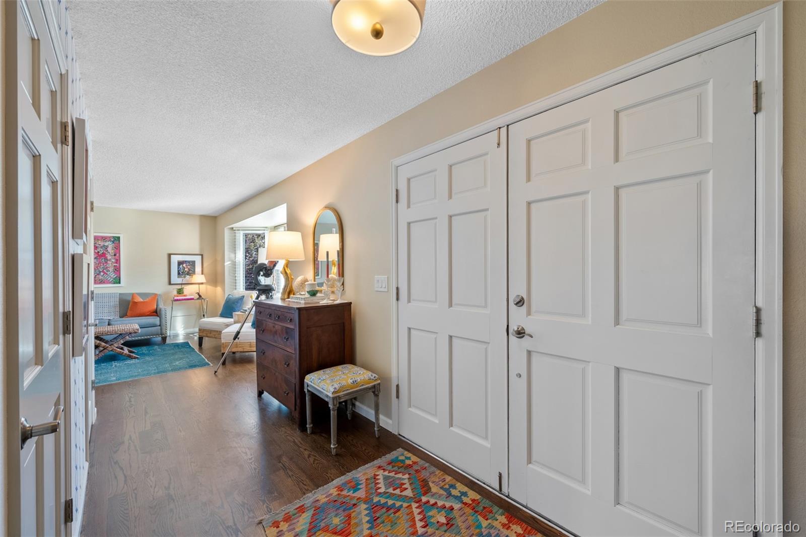 145 Willowleaf Drive Littleton, CO 80127 - Photo 5 of 42 a living room with furniture and a window