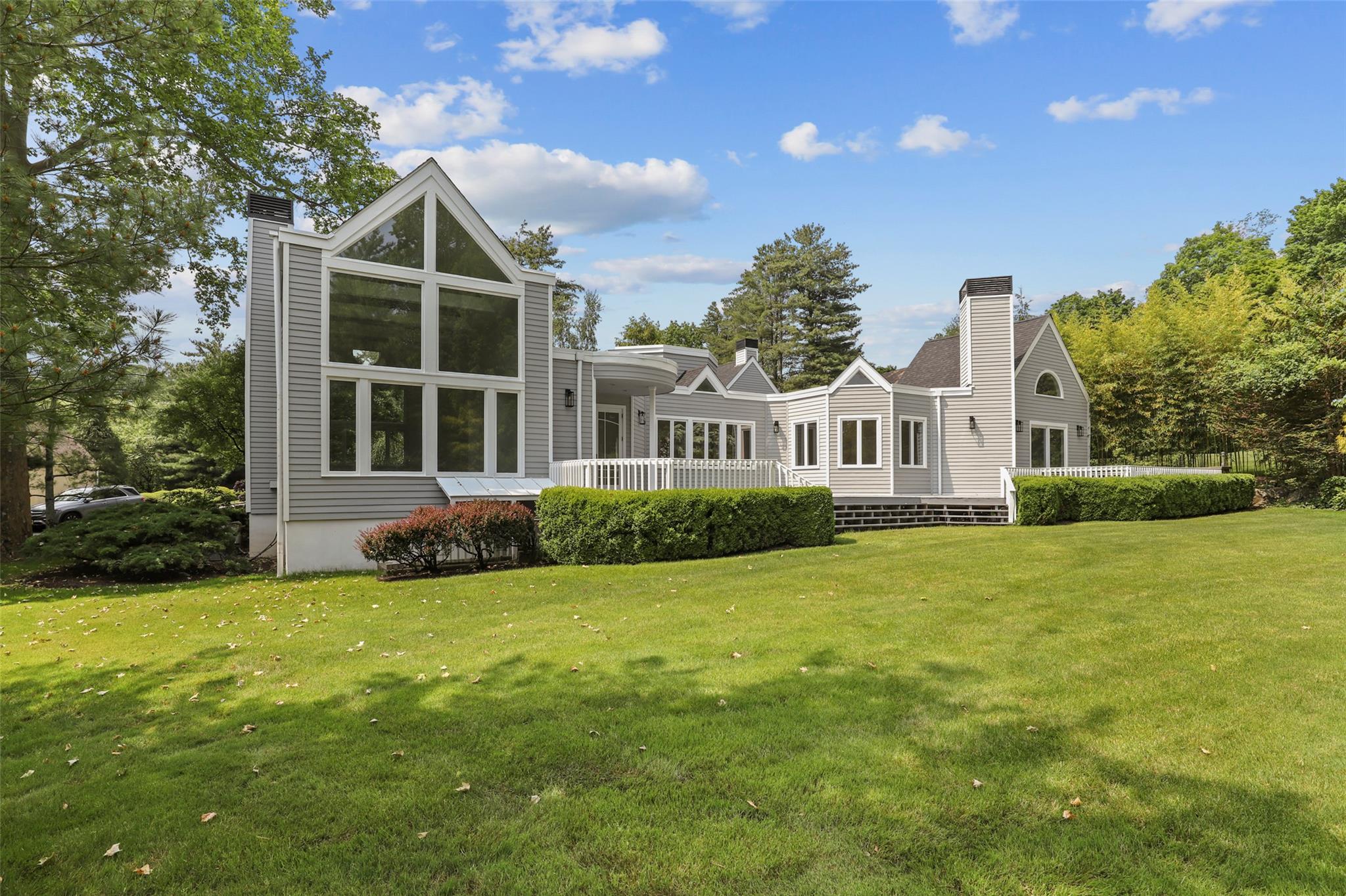 9 The Crossing Purchase, NY 10577 - Photo 1 of 1 a view of a house with a yard