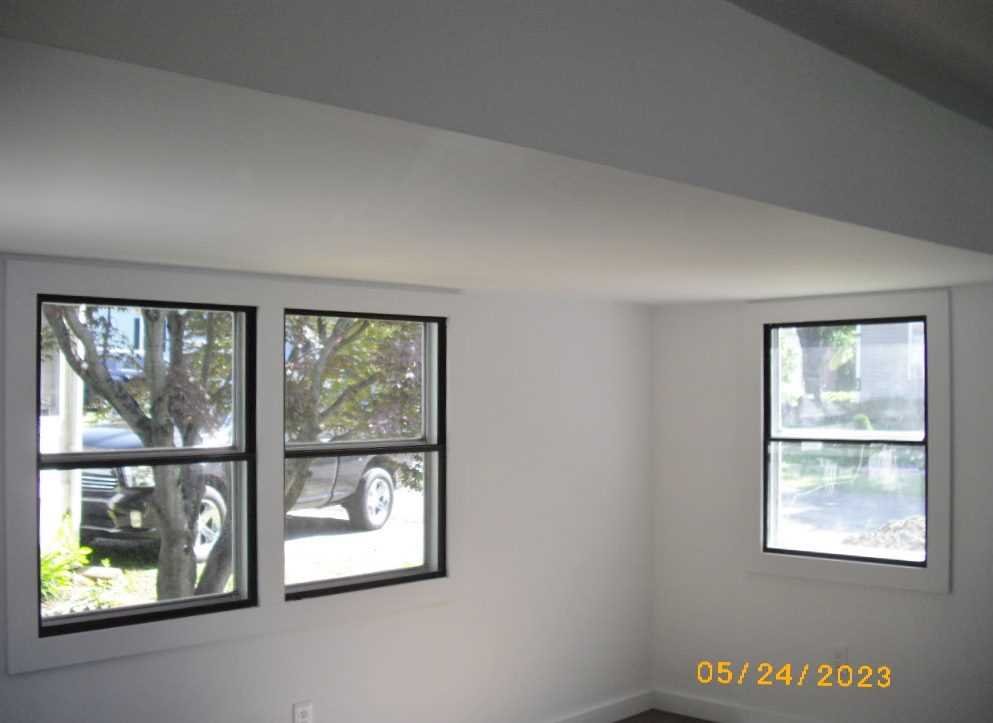 198 Sinpatch Road Amenia, NY 12592 - Photo 11 of 27 an empty room with windows