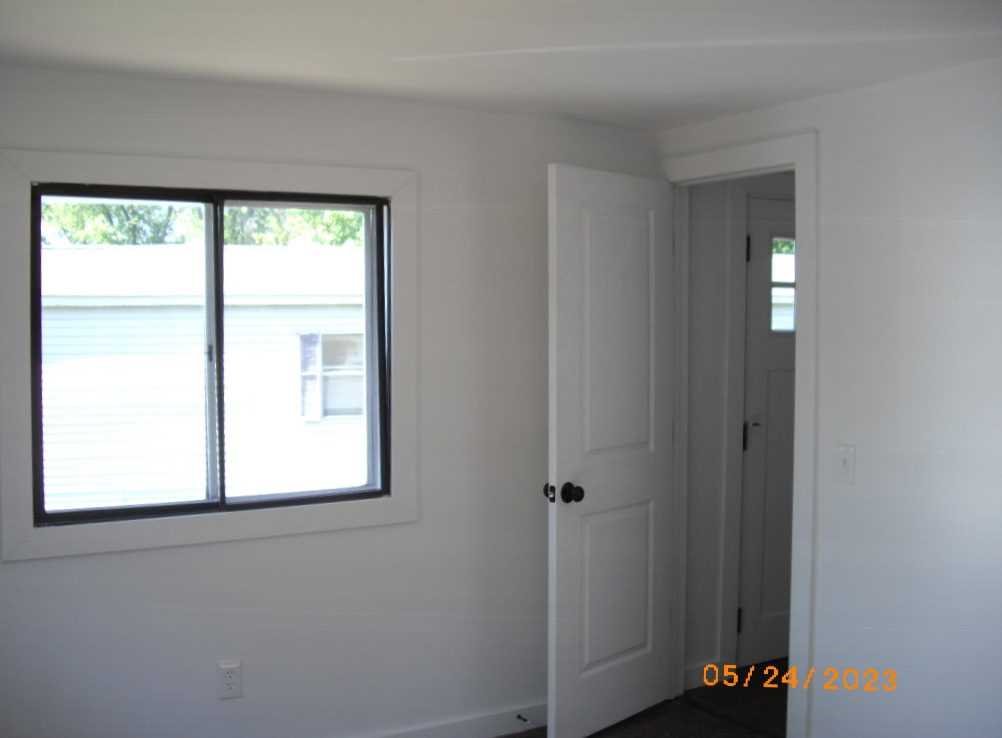 198 Sinpatch Road Amenia, NY 12592 - Photo 20 of 27 a view of an empty room with a window