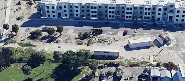 a view of balcony with furniture