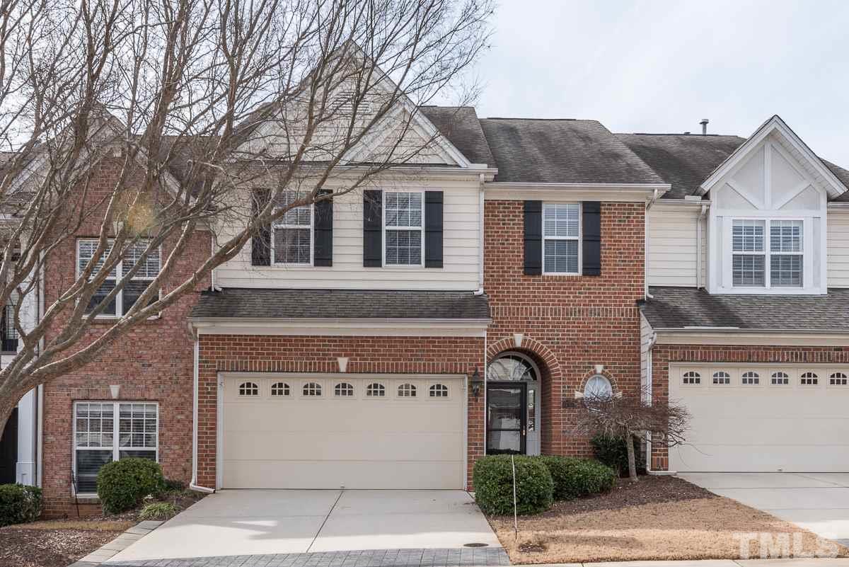 12227 Orchardgrass Lane Raleigh, NC 27614 - Photo 1 of 25 a front view of a house with a yard