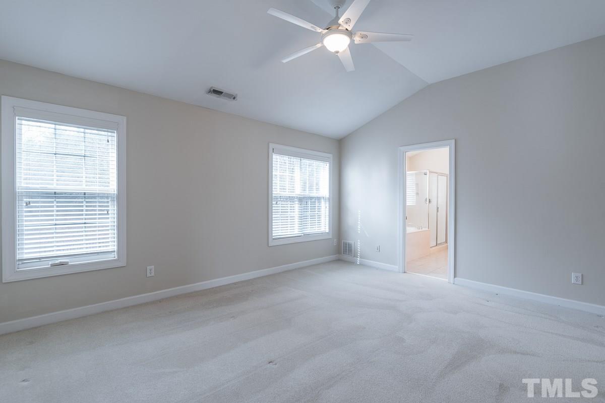 12227 Orchardgrass Lane Raleigh, NC 27614 - Photo 16 of 25 a view of an empty room with a window