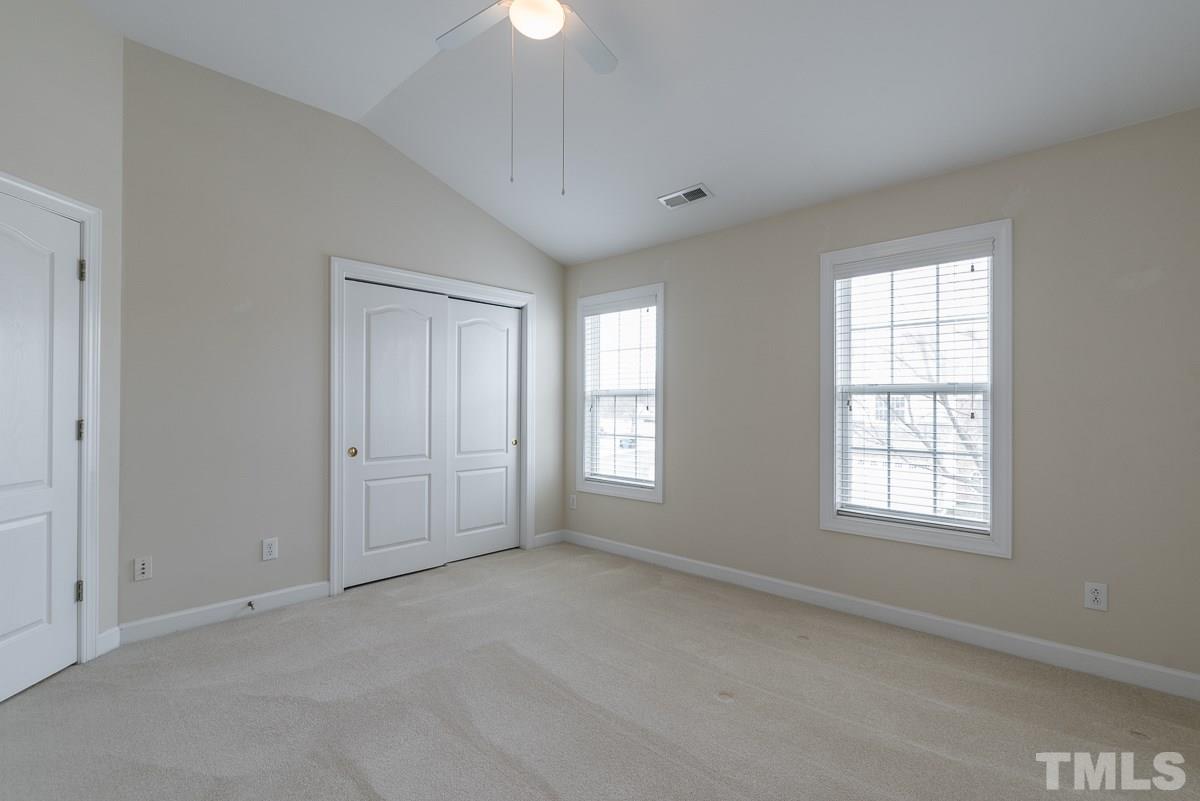 12227 Orchardgrass Lane Raleigh, NC 27614 - Photo 20 of 25 an empty room with windows