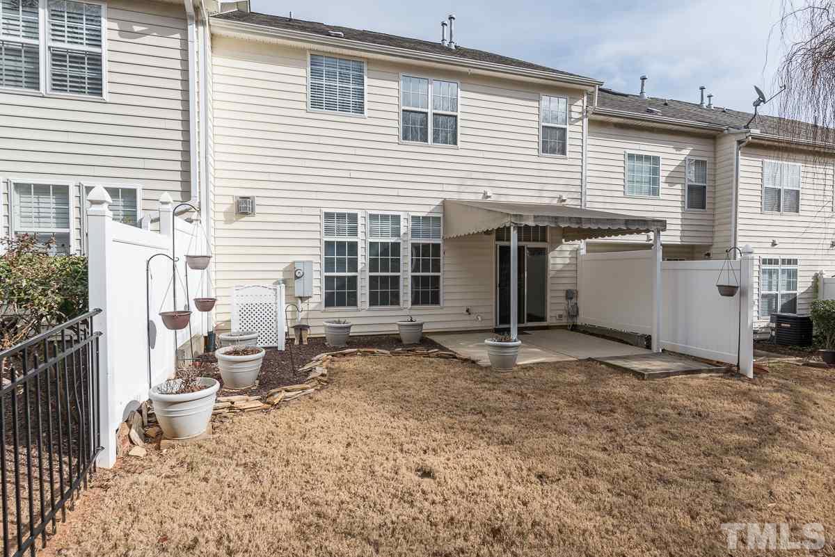 12227 Orchardgrass Lane Raleigh, NC 27614 - Photo 24 of 25 a view of a house with a patio