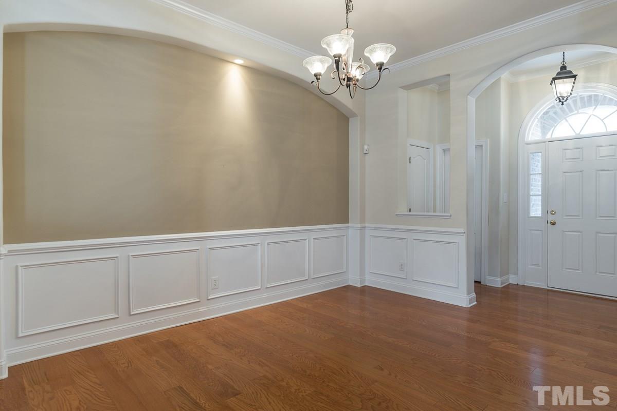 12227 Orchardgrass Lane Raleigh, NC 27614 - Photo 4 of 25 wooden floor in an empty room