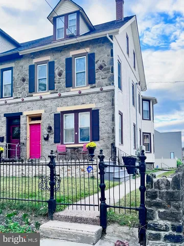 a front view of a house with a porch