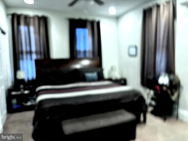 a view of bedroom with a bed