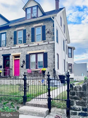 a front view of a house with a porch