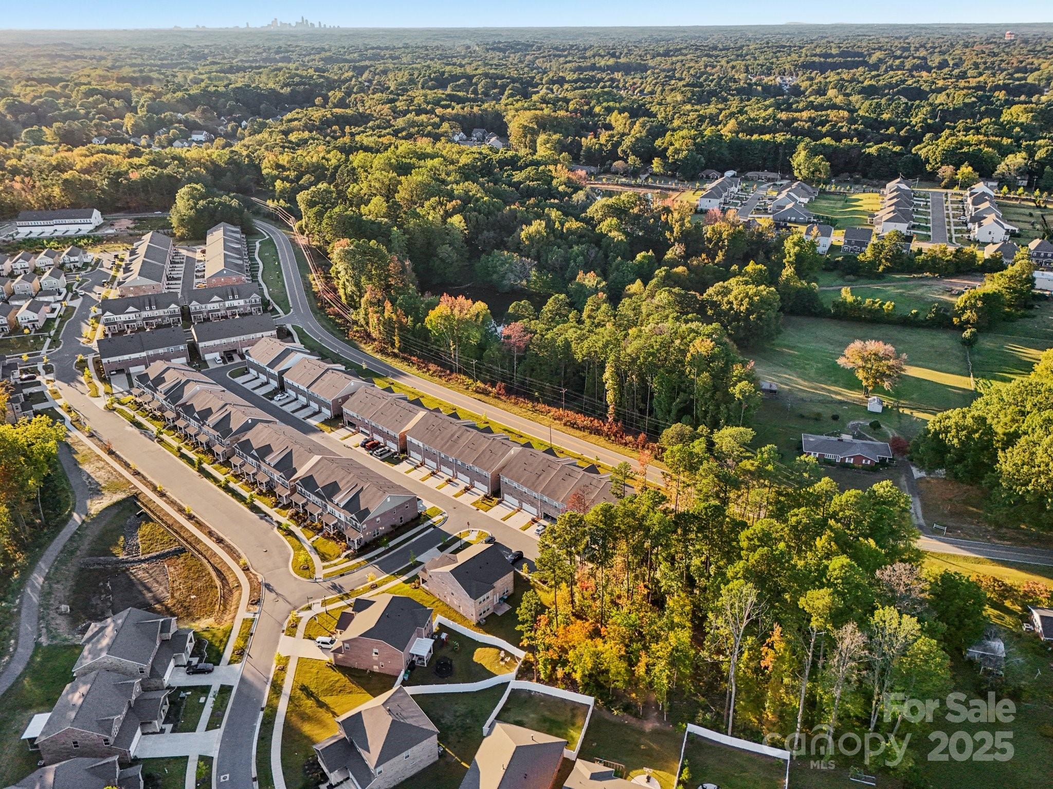 7914 Nelson Road Mint Hill, NC 28227 - Photo 18 of 25 an aerial view of residential building and lake