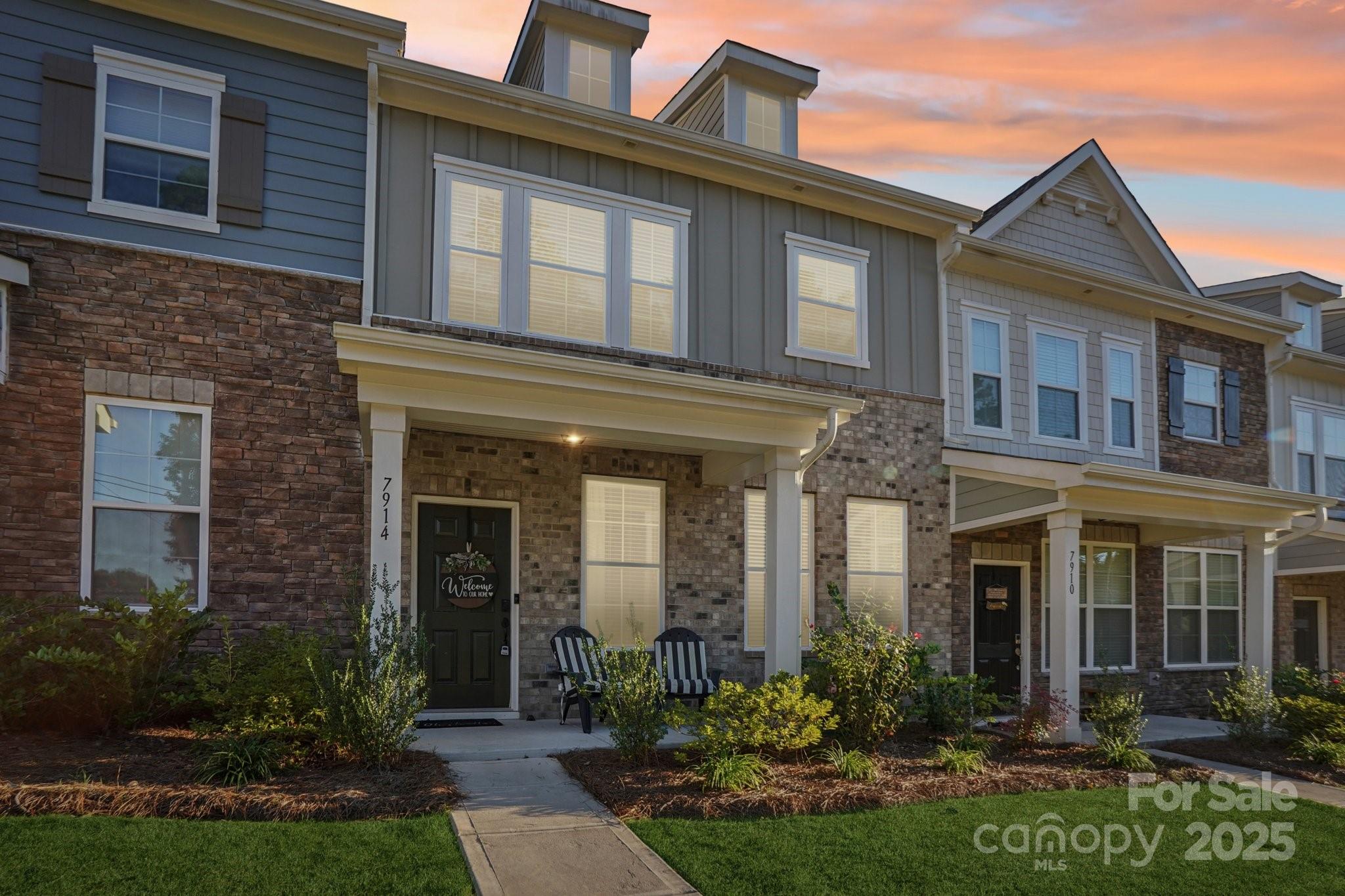 7914 Nelson Road Mint Hill, NC 28227 - Photo 2 of 25 front view of a brick house with a yard