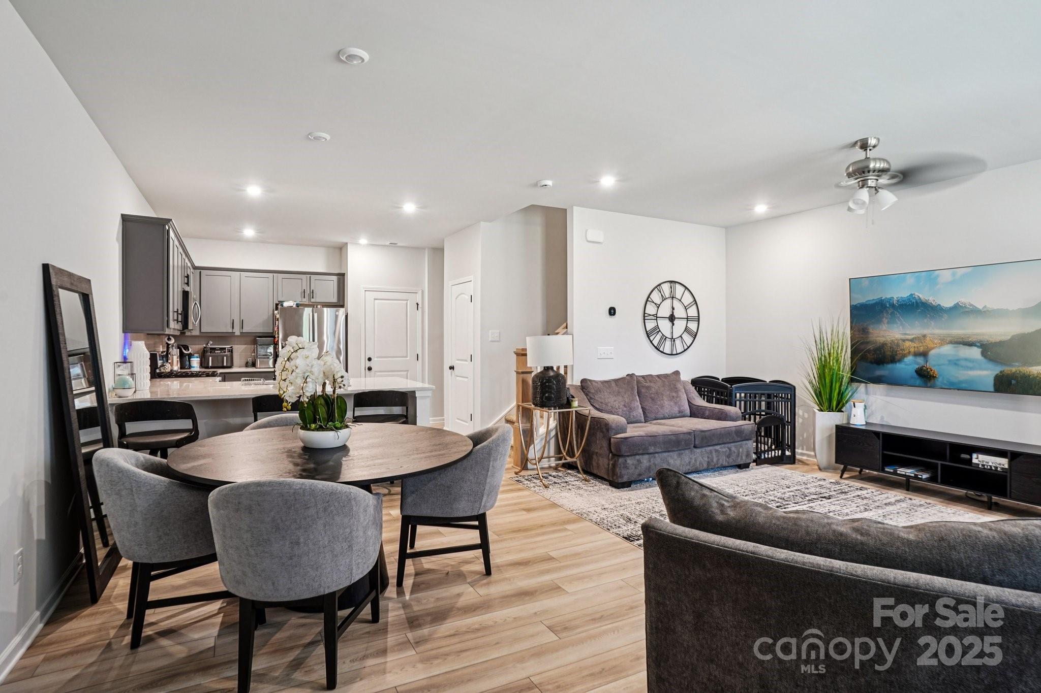 7914 Nelson Road Mint Hill, NC 28227 - Photo 4 of 25 a living room with furniture and a flat screen tv