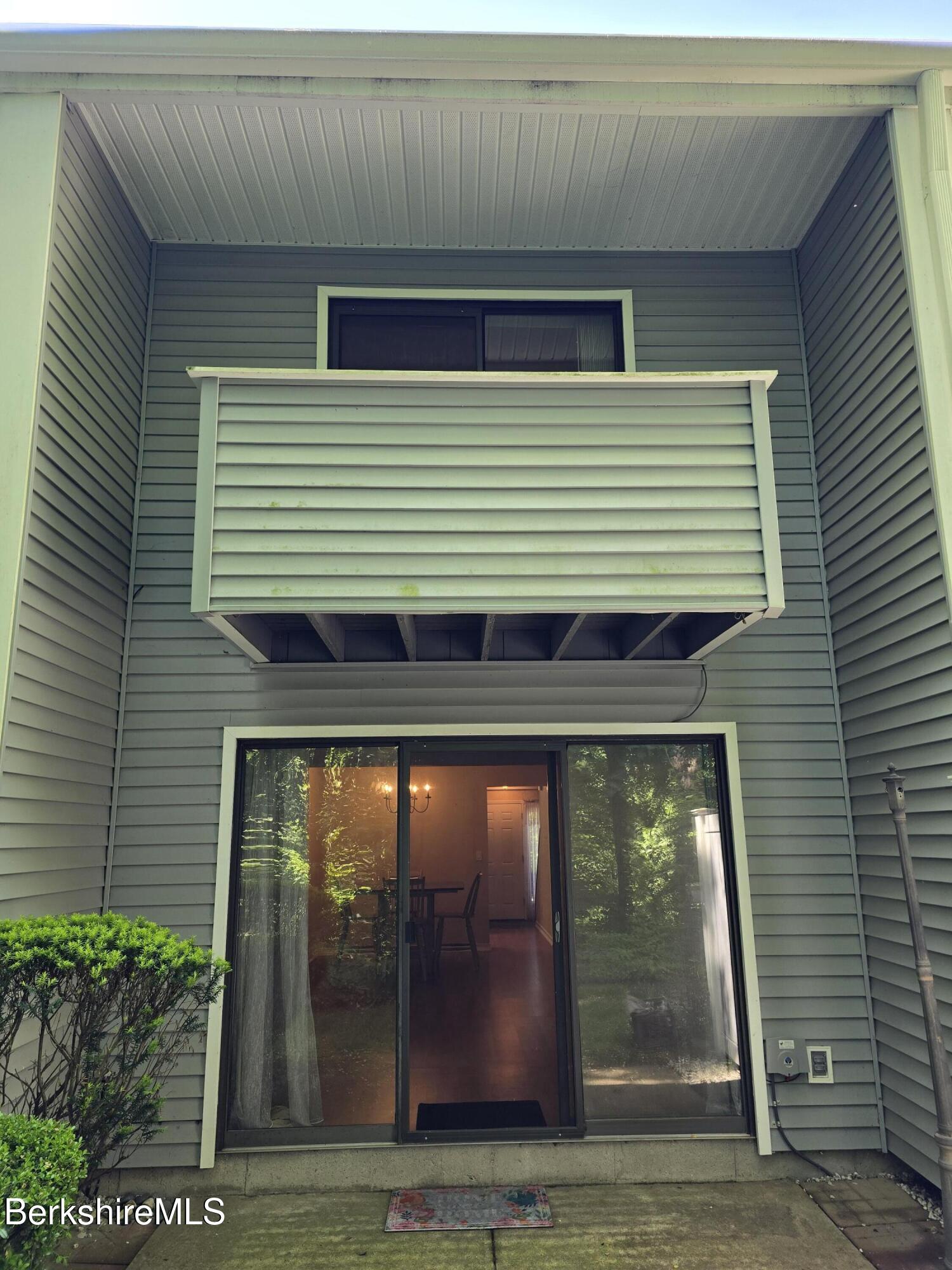 555 Russell Road, Unit J 65 Westfield, MA 01085 - Photo 8 of 20 a front view of a house with garden