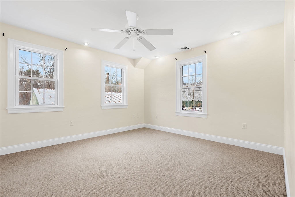 35 Water Street, Unit 35 Concord, MA 01742 - Photo 11 of 20 a view of an empty room with a window