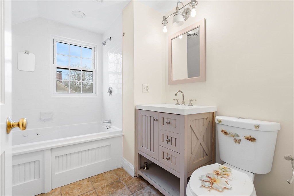 35 Water Street, Unit 35 Concord, MA 01742 - Photo 12 of 20 a bathroom with a sink a toilet and shower